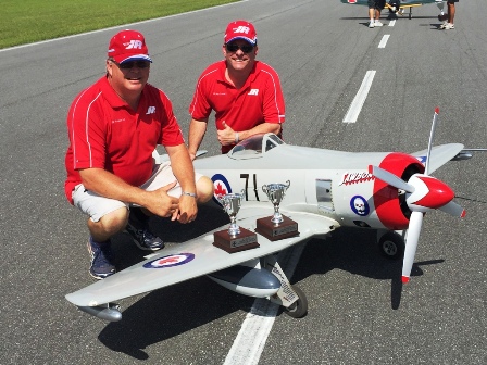 26 4Bill Freeland, Crew Chief & Greg Foushi, Pilot with 5th place Trophies for the Unlimited Class at Top Gun 2016.