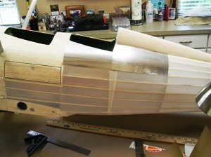 12 Adding Flight-Metal aluminum to the Solartex fabric that covers the all wood surfaces