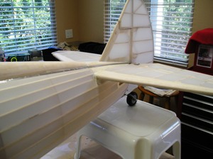 16 Rudder & elevator glued in place with epoxy then filled with balsa block sanded & covered with Solartex